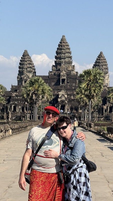 Susan and I standing on the causeway leading to Angkor Wat temple